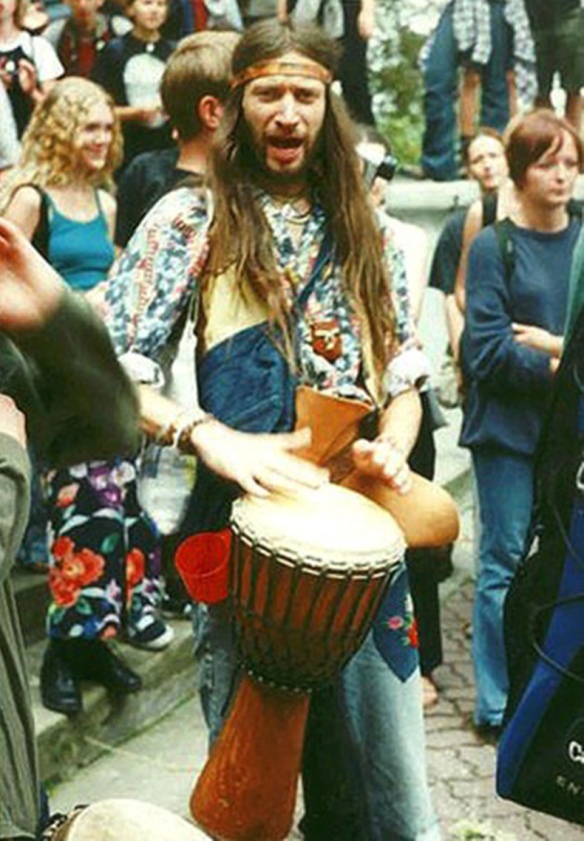 A kratom hippy banging a drum.